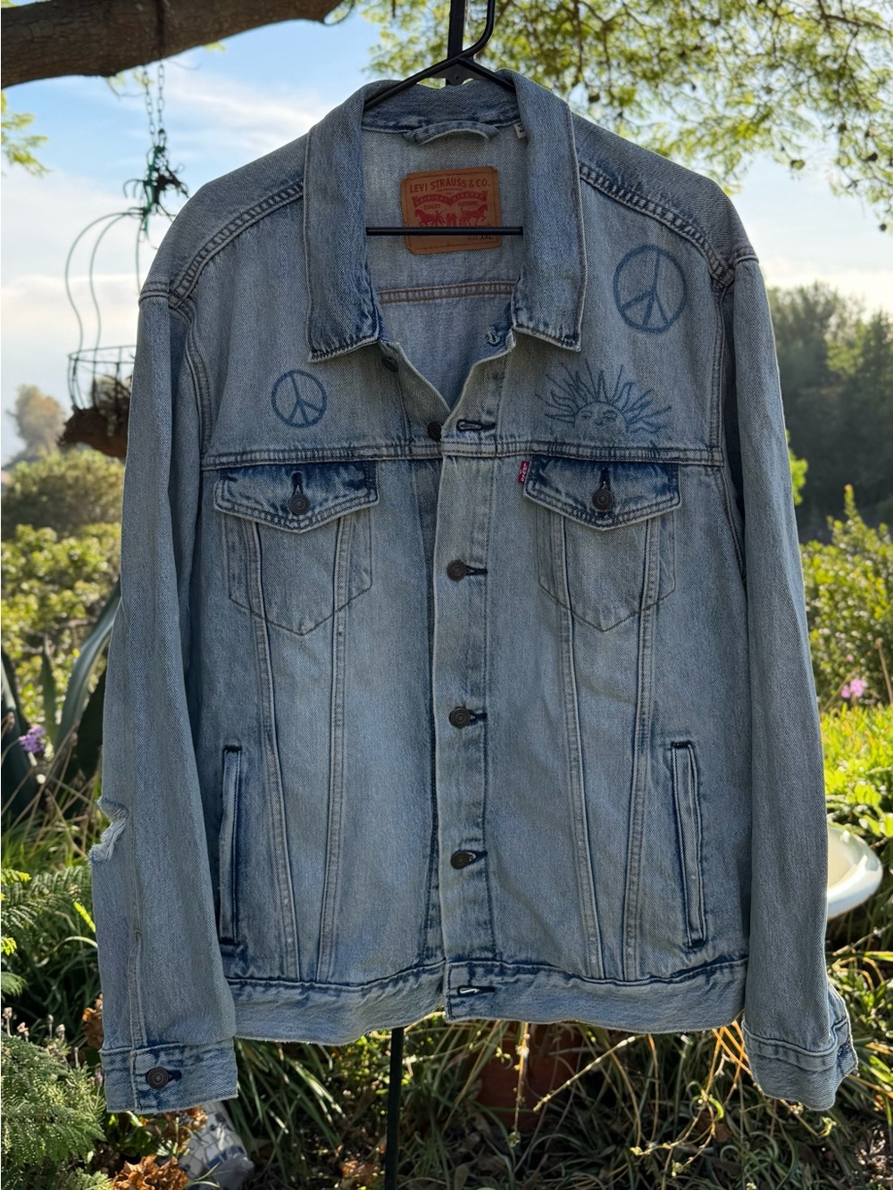 Levi's Light Blue Denim Trucker Jacket with Peace Sign Graphics